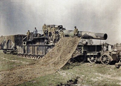 Eight French soldiers camouflaging a 370 mm railway gun with the inscription Keity, Noyon, Oise, France, September 5, 1917 by Paul Castelnau